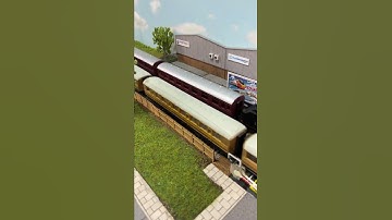 Trains passing on the Model Railway