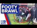 Wild brawl between players and spectators breaks out at football match | 9 News Australia