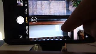 Zoom in and zoom out of iPhone camera app screenshot 3