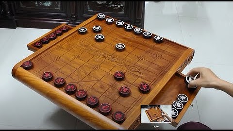 Bàn cờ tướng cuốn thư hoa mai, quân gỗ trắc