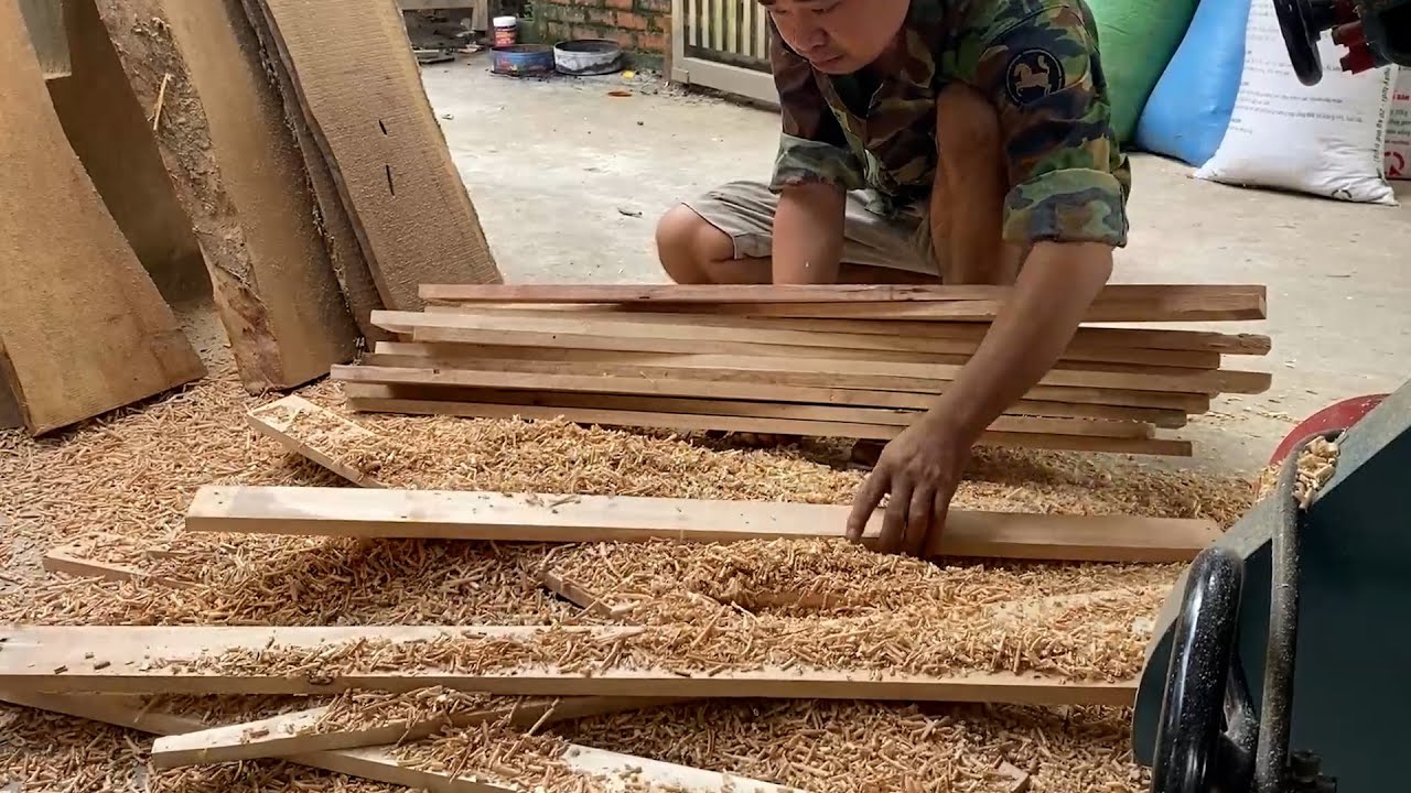 The Skillful Hands Of A Talented Carpenter Create A Table And Chairs From A Pile Of Scrap Wood