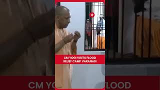 CM Yogi Distributes Food Kits, Chocolates to Flood-Affected Kids in Varanasi