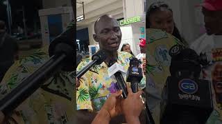 Dr Likee boy Gruma speaks at the arrival hall of Accra Airport to welcome his boss.
