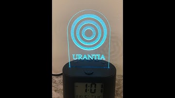 Urantia LED desk clock with acrylic display