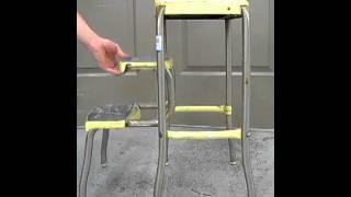This step stool is unusual in that the legs hop out from under the stool, rather than flip. $5.99 at Seattle