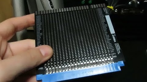 Converting a rare arcade game to JAMMA using a matrix style universal adapter.