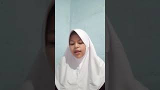 Membaca dan menjelaskan hukum tajwid pada surat Al Taubah ayat 105