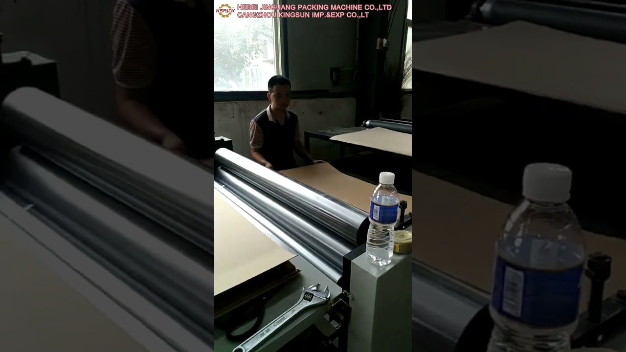 SHEET PASTING MACHINE