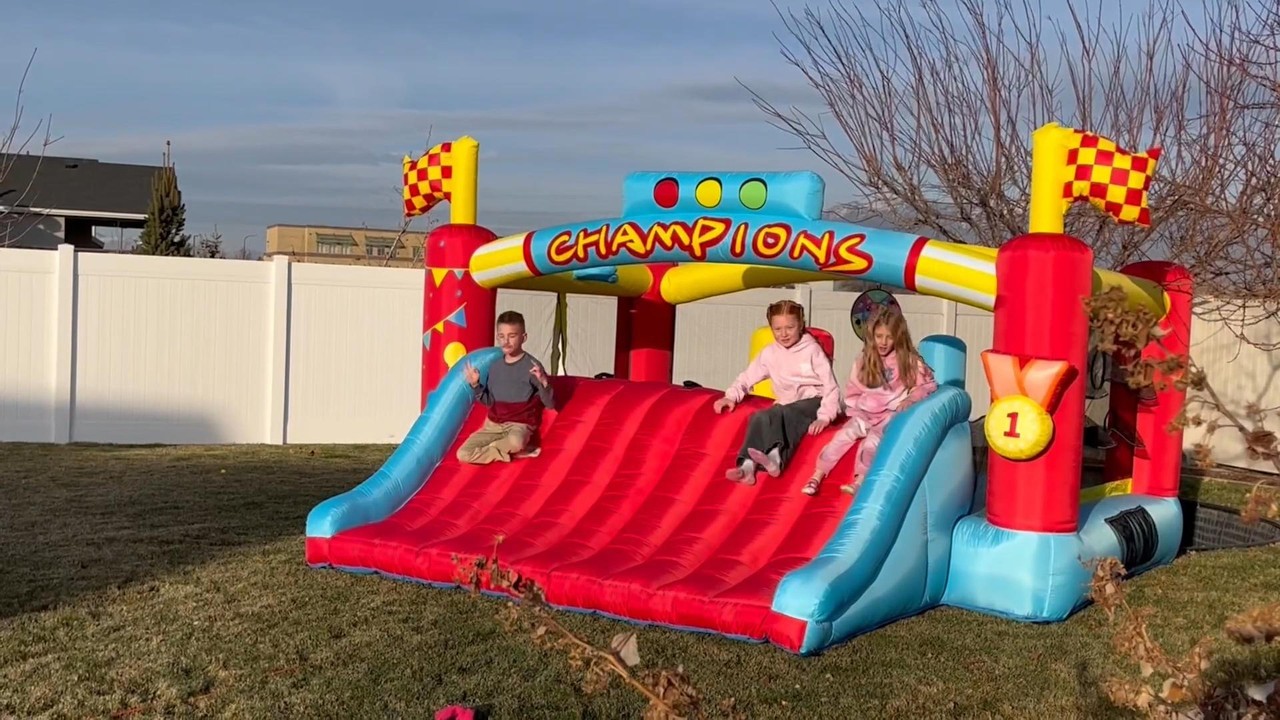 AKEYDIY Inflatable Bounce House with Extra Wide Slide & Climbing Wall.