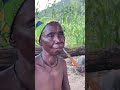 Woman from the Koma tribe smokes some tobacco from her hand carved pipe | Cameroon #shorts