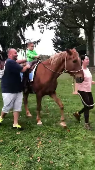 Dave & Ava - David riding the BIG HORSE @ his school event