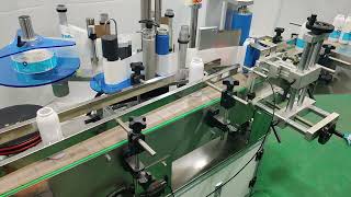 Automatic positioning vertical round bottle self-adhesive labeling machine