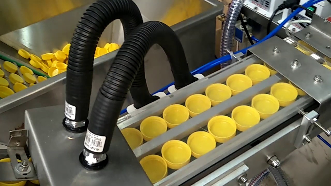 cap wadding machine with dustry remover - YouTube