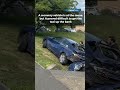 Taxi rolls down bank into house