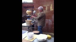 Steven Hill spraying glaze & talking process