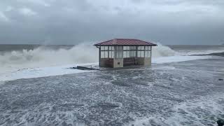 Prom Shelter takes a battering from the waves at Llandudno