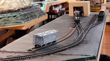 Trains on the extension module. Hand laying track.