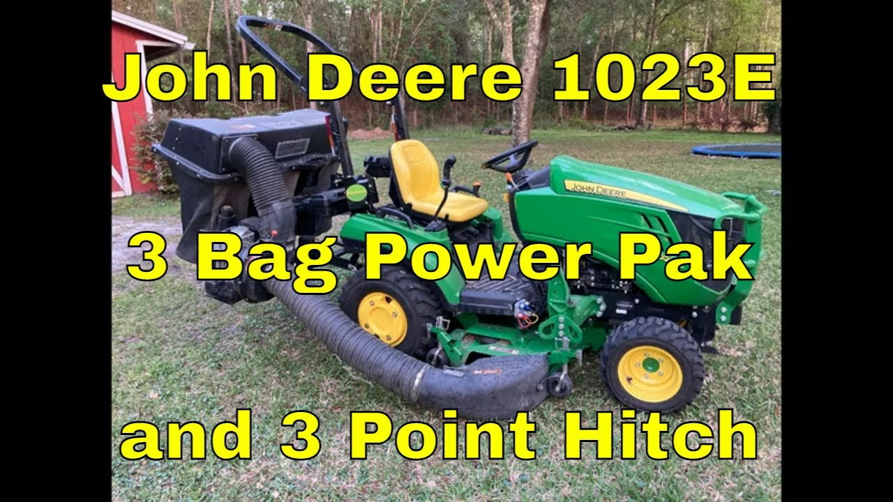 John Deere 1023E and the 3 Point Hitch Bagger - YouTube