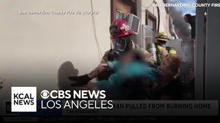 Dramatic video captures moment San Bernardino firefighters pull woman from burning home