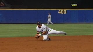 FLA@ATL: Miggy dives, makes strong throw for the out