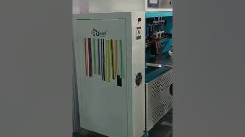 Autoloop handle attachment machine #bagprinting #nonwovenbagmakingmachine #nonwovenbagprinting