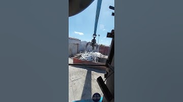 TEREX FUCHS, loading ally extrusion into bin,for processing