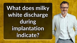 What does milky white discharge during implantation indicate