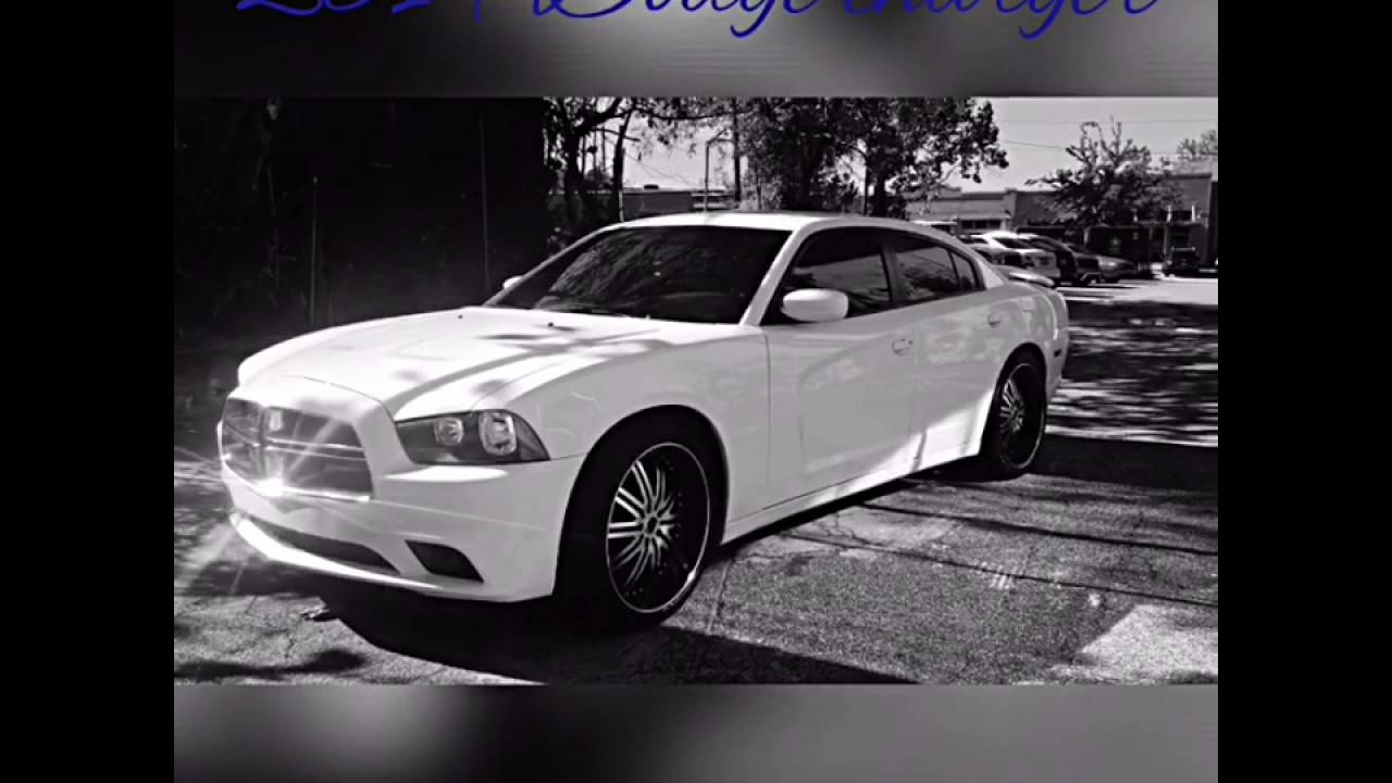 2014 Dodge Charger sitting on 22'' Versante 212 Chrome wheels with 265/