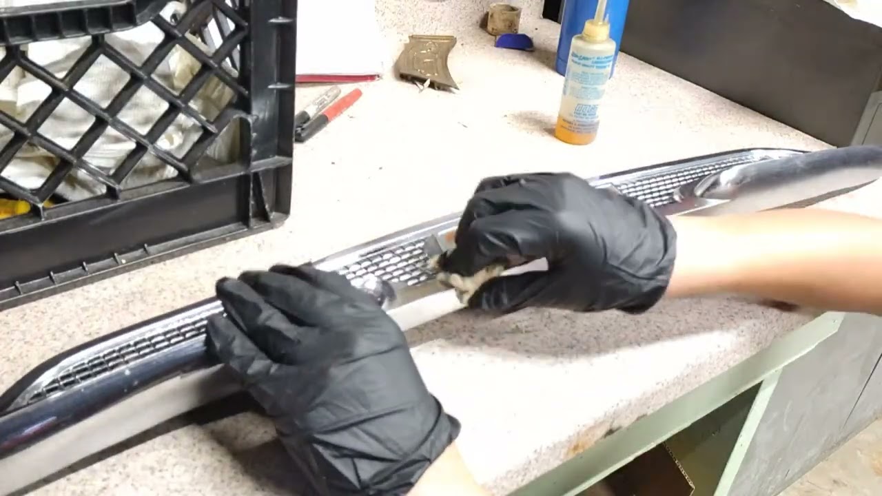 Shining up a 1958-59 Chevy truck hood trim.