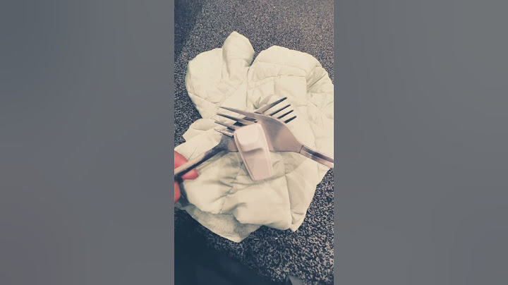 How to: Remove a security tag from clothing with two forks