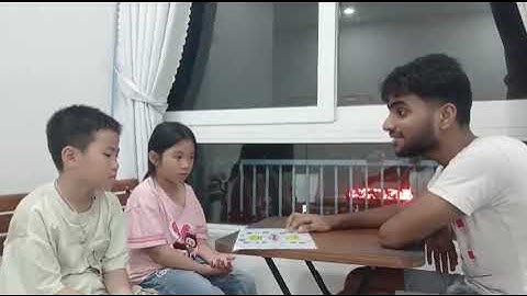 Tiếng Anh Giao Tiếp Phan Thiết: Harry and Hân practice talking about Wand and Need