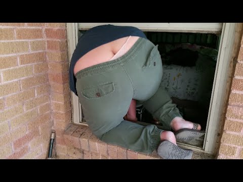 Woman Gets Stuck In Window