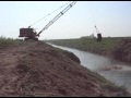 Old O&K R7 dragline cleaning river bank - Italy 2011