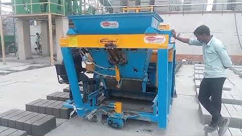 Auto feeder bin type concrete block making machine by Everon impex 9843762454