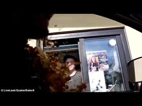 Perfect moment McDonald's drive-thru girl throws large Coke over driver
