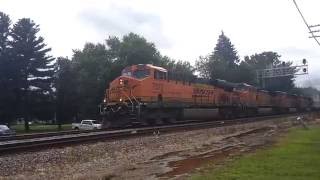 BNSF 7572 leads smoking Dash 9 on EB stacktrain