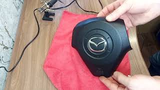 Замена эмблемы руля Mazda 3 BK.