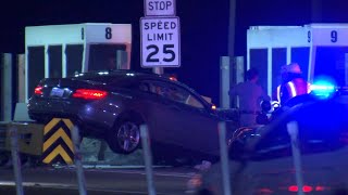 Car wedges between Bay Bridge Toll Plaza booths in solo crash