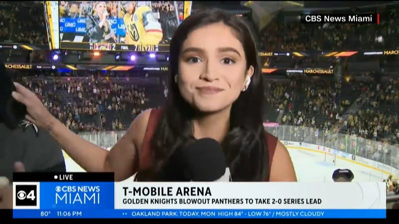 Sports reporter stiff arms fan trying to get in her live shot at