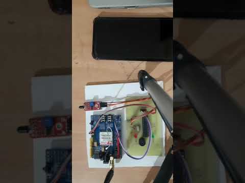 GSM based fire alarm system with SMS and buzzer alert.