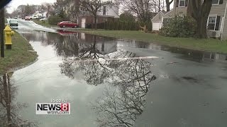 Rain floods some streets in Milford