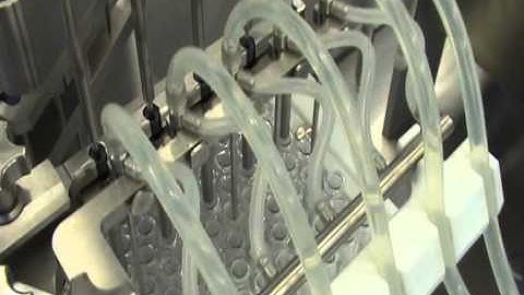 Nested Syringe filling and Stoppering Machine