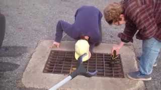 Dropped Her Keys In A Storm Drain.