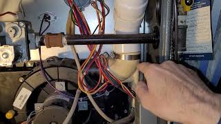 Leaking Goodman furnace under the inducer motor