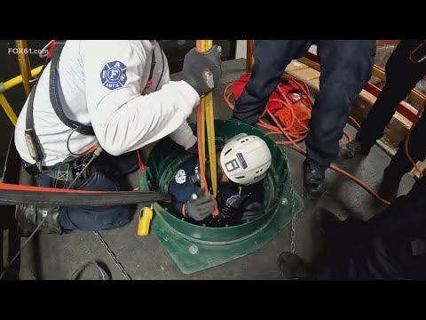 Here's how firefighters train to make confined space rescues