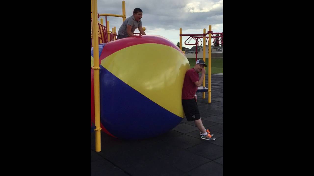 Aaron sitting all giant beach ball may 2016