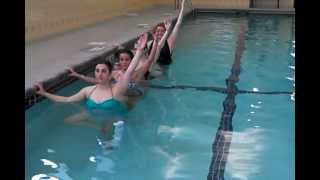 Hannah Teaches Balance Yoga Poses Using Edge Of Pool