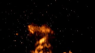 Burning Ash Rise From Large Fire | 4K Black Background | Stock Footage | Seamless Loop Video