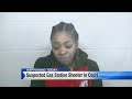 Woman charged in Detroit gas station shooting