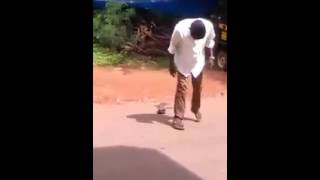 Funny Drunken Man Trying To Wear A Slipper